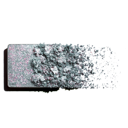 Makeup eyeshadow refill with pink and lilac pearl shimmer powder on a white background