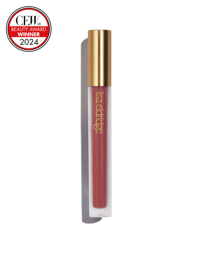 Dark, pink berry liquid lip colour with gold cap on a white background, featuring a CEW Beauty Award Winner 2024 badge.