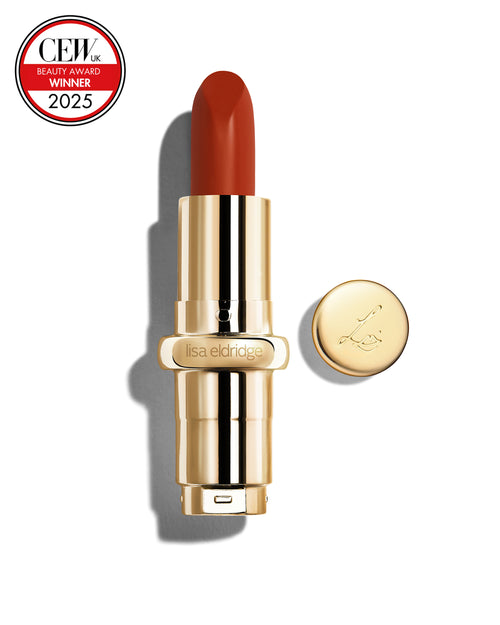 Chilli-red coloured lipstick with gold casing and 'Lisa Eldridge' branding on a white background, featuring a CEW Beauty Award 2025 badge.