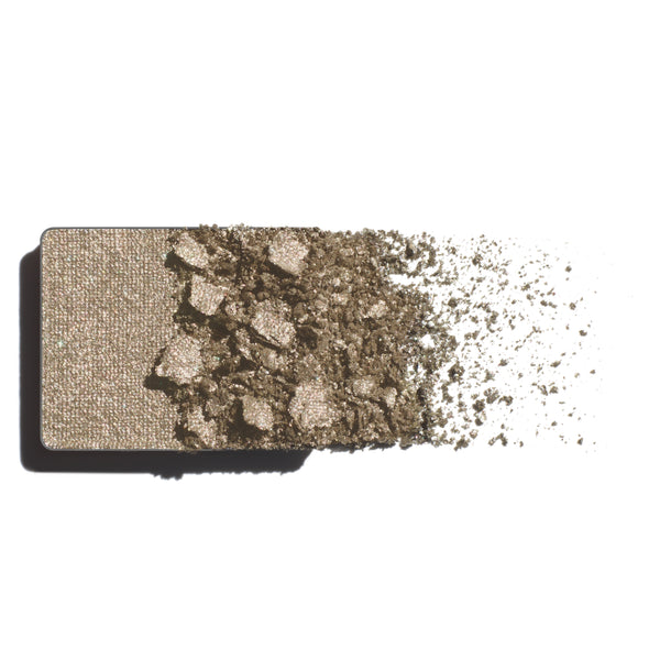 Makeup eyeshadow refill with sage green with silver pearl powder on a white background