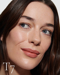 block The white pod packaging of Seamless Skin Enhancing Tint by Lisa Eldridge