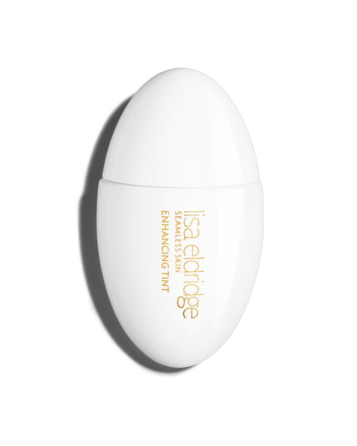The white pod packaging of Seamless Skin Enhancing Tint by Lisa Eldridge